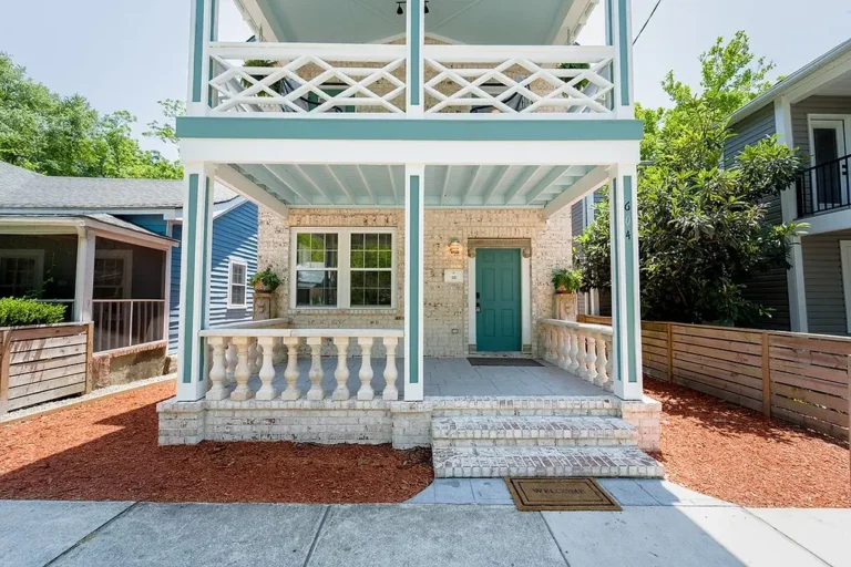 Front porch addition by Legacy Renovations for an AirBnB in the Castle Street District