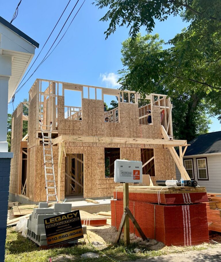 New residential build mid-construction with exposed wood framing by Legacy Renovations in Wilmington, NC